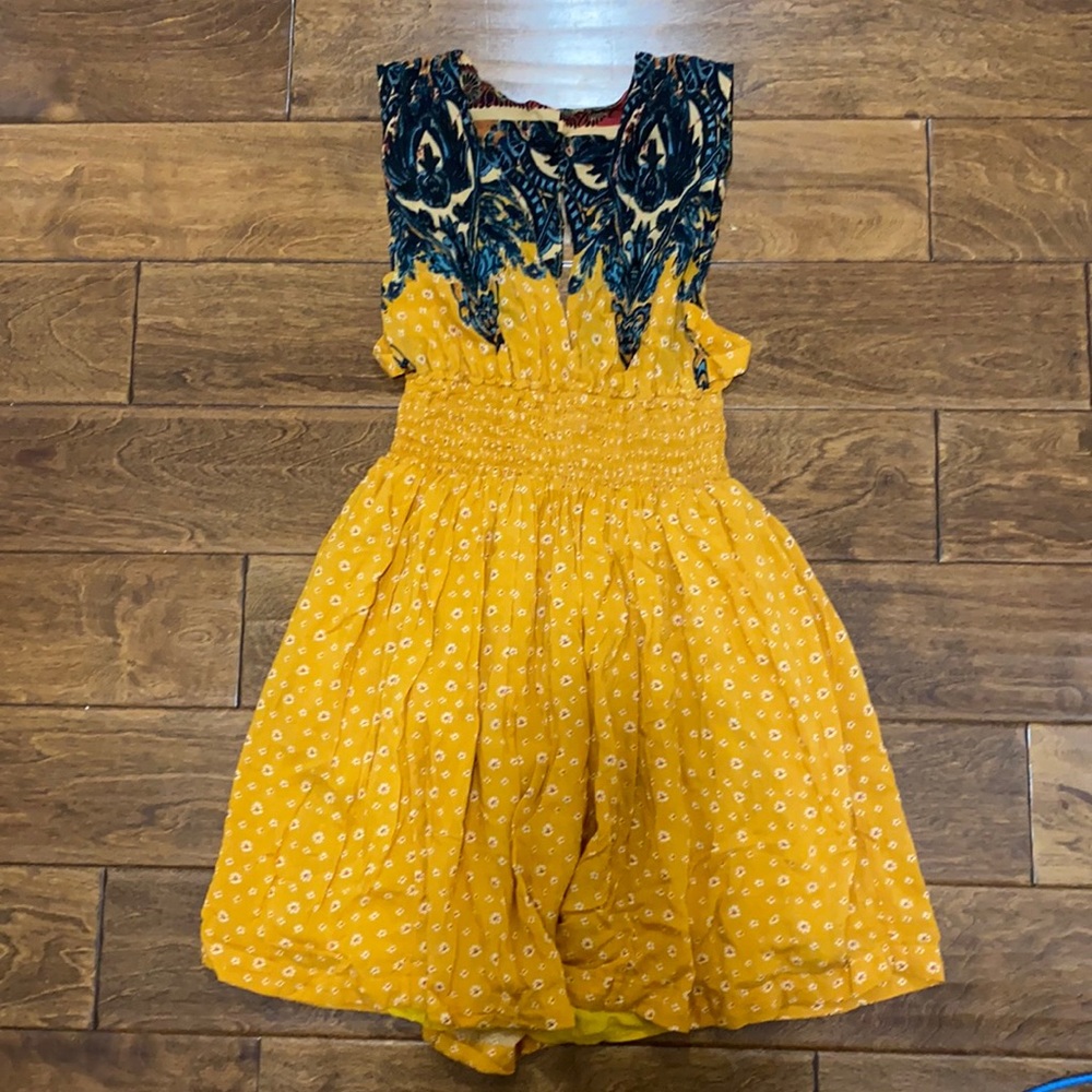 Free people mini dress lined with smocked waist and pockets